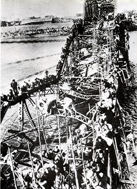 1951 Pulitzer Flight-of-Refugees-Across-Wrecked-Bridge-in-Korea